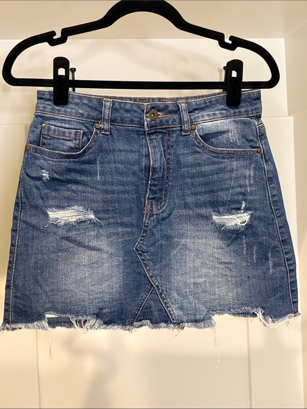 Wax Jean Distressed Medium Wash Denim Mini Skirt